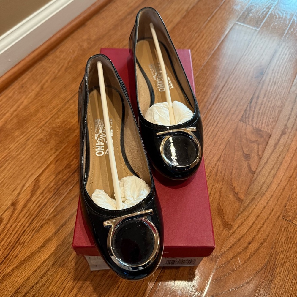 Salvatore Ferragamo Black Patent Leather Flats with Gold Accent